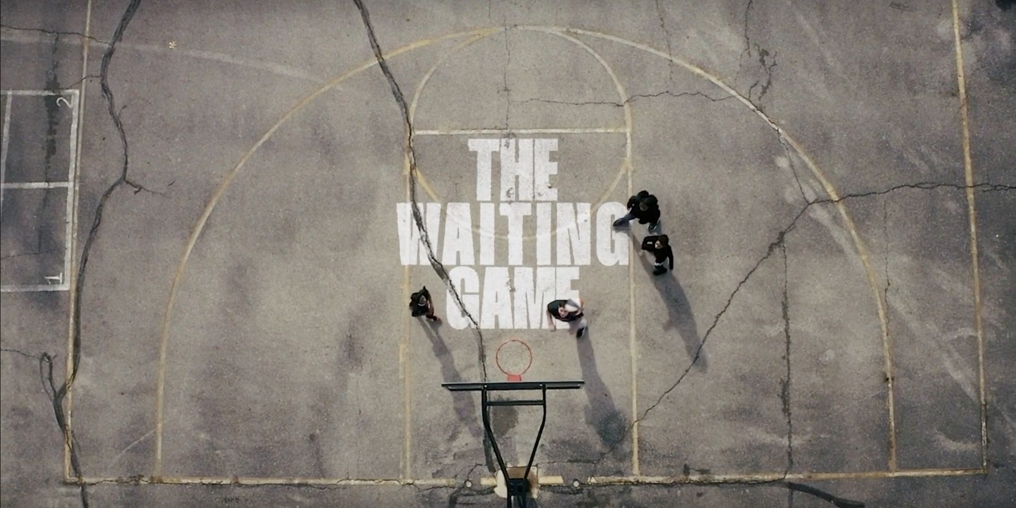 The Waiting Game title over a cracked basketball court